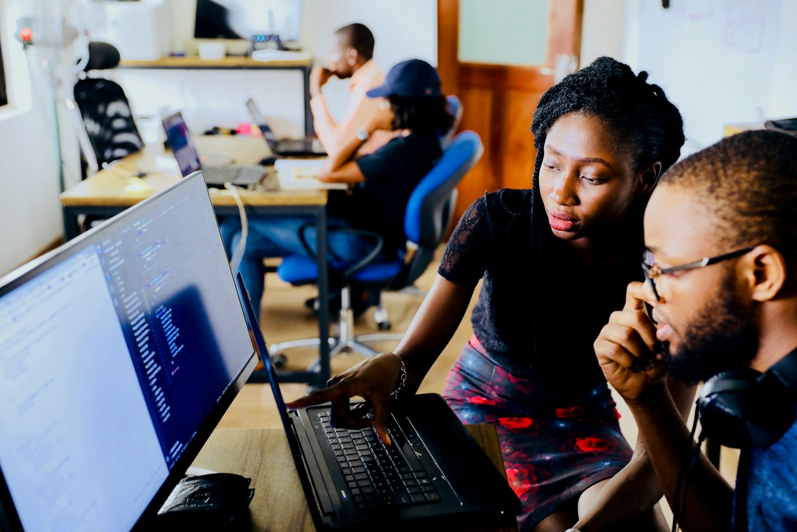 A professional guiding a student during a learning session